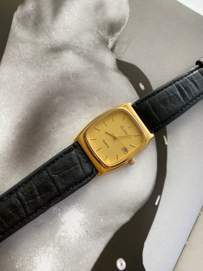 Vintage Dumai unisex Gold Watch from the 1990s